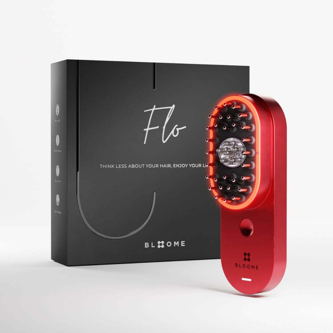 FLO™ hair and scalp care device by Bloome™ with red light therapy, microcurrent, serum release, warmth, and scalp massage to stimulate hair growth.